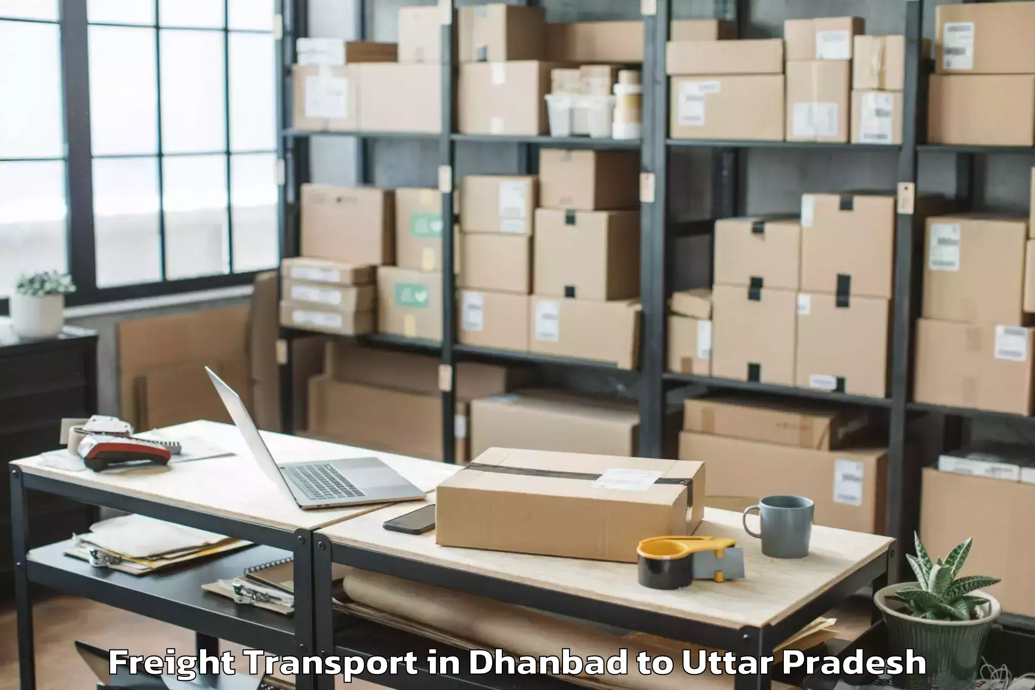 Get Dhanbad to Khadda Freight Transport